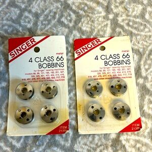 Two sets of brand new old class 66 bobbins for singer, sewing machines